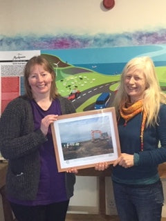 Hazel Mackenzie receives a thank you gift from Shetland Amenity Trust’s Peatland Project Officer; Sue White.